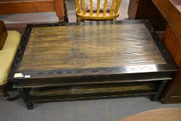 A 20th century imported wood coffee table, the centre panel slatted with bamboo. 120CM.