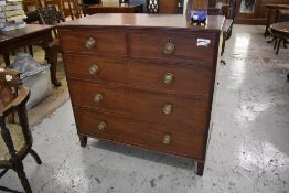 A 19th century mahogany chest of 2 / 3 cockbeaded drawers, each with moulded brass knob handles,