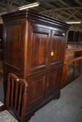 A 20th century stained mahogany television cabinet, in the 19th century style. 157CM. X 110CM.