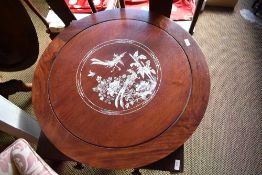 A 20th century Chinese Mother of Pearl inlaid hardwood lazy Susan, of circular form with central