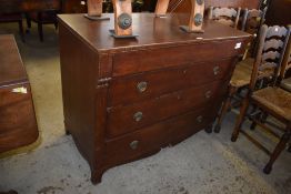 A Victorian chest of four drawers, The rectangular top with blind frieze drawer over three long