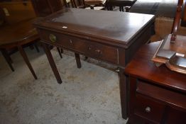 A late George III mahogany fold over tea table, with moulded edge detail and swivel action, the rear