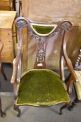An Edwardian mahogany Art Nouveau design armchair, seat height 45CM.