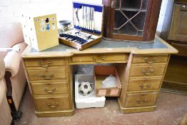 A Victorian Inverted breakfront light oak pedestal desk, with moulded edge detail and chamfered