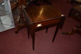 A Georgian inlaid mahogany dropleaf hall table, the tapering square section legs surmounted by