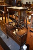 A 1940s oak dressing table with bobbin turned and key pattern decoration, sold along with a 1940s