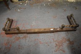 A 1940s oak extending fire curb. 108CM.