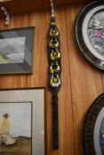 A vintage brass and leather Martingale. 97CM.