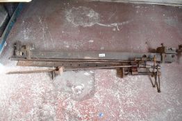 A group of three vintage metal sash clamps