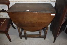 A 19th century oak dropleaf gateleg table, having single drawer over turned supports 79CM. X 83CM.
