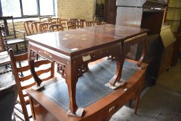 A pair of modern Oriental hardwood coffee tables, inlaid with the brass scrolling designs 42CM X.