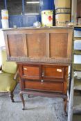 An Edwardian mahogany cabinet with adapted interior, together with a 1940s oak blanket box(AF)