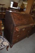 A 19th century Mahogany bureau of traditional design. 114CM. X 107CM. Replacement handles.