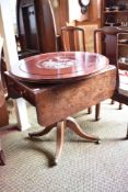 A Victorian mahogany pedestal Pembroke table, with reeded edge detail over single end drawer