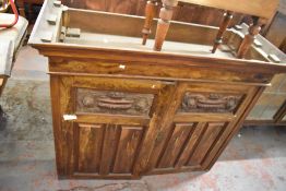 A Victorian Walnut press cupboard top, with moulded cornice above plain frieze and two triple