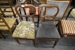A pair of Victorian mahogany balloon back dining chairs sold together with a 19th century mahogany