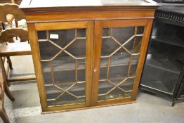A 19th century astragal glazed mahogany bookcase top with dentil moulded cornice above a plain