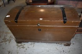 A large Dome topped grained pine blanket box, the top with painted strapwork design. The interior