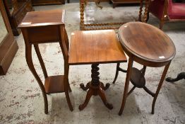 An Edwardian inlaid mahogany oval occasional table, a Victorian mahogany barley twist stem table and