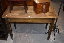 An early 20th century stained pine drop leaf kitchen table of small proportions. 77CM. X. 116CM Some