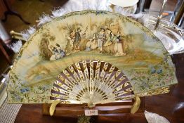 A 19th century mother of Pearl fan the concertina paper leaf, with ostrich feather trim, hand