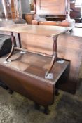 An early 20th century oak dropleaf gateleg table sold together with a reproduction mahogany coffee