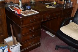 A reproduction mahogany twin pedestal desk with triple tooled leather skiver. 75CM X 152CM.