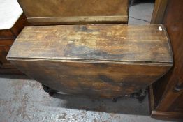 A 19th century oak barley twist gateleg table with demilune flaps. 72CM. X 114CM.