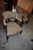 An Edwardian stained mahogany tub form armchair with foliate patterned upholstery, sold together