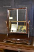 A Victorian mahogany swing dressing mirror of traditional design. 60CM.