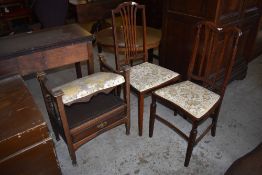 Two Edwardian inlaid mahogany bedroom chairs, each with boxwood stringing and conforming upholstery.