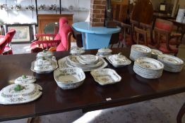 A large quantity of Copeland Spode for Waring and Gillow Ltd foliate patterned dinner wares, to