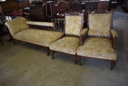 A late Victorian mahogany three piece lounge suite, comprising chaise longue and his and hers