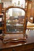 Victorian figured mahogany swing dressing mirror of traditional design. 80 CM