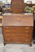 An Edwardian mahogany bureau of traditional design, 106CM X. 93CM.