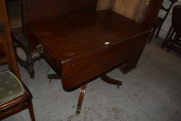 A 19th century mahogany pedestal pembroke table, of traditional design with single end drawer,