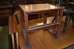A nest of two G-Plan teak coffee tables, bearing lable to underside. Largest. 46CM.
