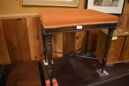 A 19th century mahogany stool, with turned supports and X form stretcher. 51CM X 50CM