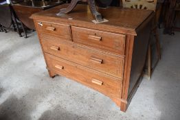 An Edwardian inlaid mahogany chest of 2 / 3 drawers, the drawers with inlaid geometric banding and