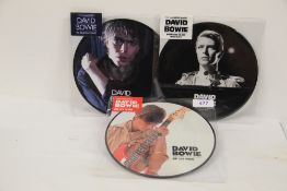 A lot of David Bowie 40th Anniversary edition pic discs ' be my wife ' breaking glass ' and '