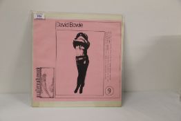 A David Bowie Vinyl album -bump and grind -rare early bootleg