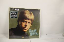 A David Bowie RSD sealed issue of his debut mono and stereo on blue and red vinyl