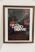 A framed David Bowie band Autographed world tour poster from 2018 - 45 cm by 55 cm