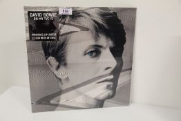 A Vinyl Album David Bowie Recording -Slinky Secrets - on my TVC15 - numbered limited edition blue