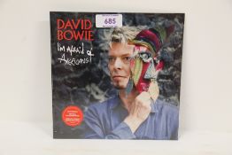 A David Bowie ' i'm afraid of Americans ' sealed red vinyl 7' - rare now and getting hard to