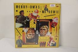 A Vinyl Album David Bowie Recording - Merry Christmas Mr Bowie - Tokyo '78 with poster
