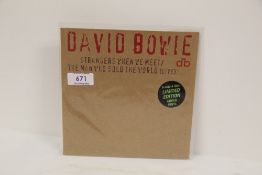 A David Bowie ' Strangers when we meet ' limited edition - green vinyl 45 - mint