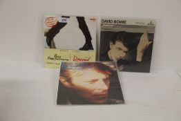 A David Bowie lot of three Euro pic sleeves for 'heroes' and ' boys keep swinging '(2)