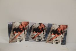 A lot of David Bowie ' shape of things to come ' - two sealed 45's and a mint picture disc - rare
