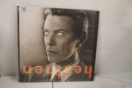 A David Bowie 'heathen ' orange vinyl press